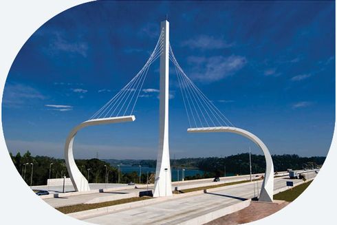 A large white bridge with curved supports - Inter-American Development Bank - IDB